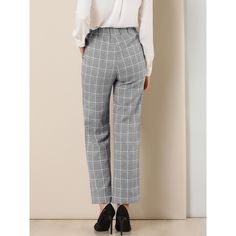 These pants are essential for dressing up or down. Lightweight fabric, covered in a plaid pattern, shapes these trendy trousers with a high-rise fit. How it is a bit high waist and how it gathers at the waist adding shape to the body. You may love everything about these trousers, from their regular fit to the elastic high-waist, which could double as a hiding mechanism for women with love handles. Style these trousers with a crop top and heels for the ultimate look. This fashionable and trendy c Chic Plaid Bottoms For Business Casual, Tailored Casual Plaid Pants, High-waisted Plaid Pants For Business Casual, Plaid High-waisted Pants For Business Casual, Plaid High-waisted Pants For Work, Chic High-waisted Plaid Pants, Tailored Plaid Casual Bottoms, Plaid Workwear Pants With Elastic Waistband, Plaid Pants With Elastic Waistband For Work