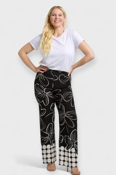 Step out in style with our Ava Black & White Floral Pants, crafted in Italy with lightweight viscose fabric. Designed for curvy women, these palazzo style wide-leg pants feature an elastic waistline and high rise for comfort and a flattering fit. Perfect for any occasion, pair with our matching blouse for a chic monochromatic look or mix it up with a pop of color and our Ava Black and White duster. Elevate your wardrobe today! Made in Italy by OltretempoComposition:100% ViscoseFit: Model is wear Loosely Fitted Viscose Wide Leg Pants, Viscose Wide Leg Pants With Elastic Waistband, Ankle-length Viscose Wide Leg Pants With Elastic Waistband, Viscose Stretch Wide Leg Bottoms, Stretch Wide Leg Viscose Bottoms, Stretch Viscose Wide Leg Bottoms, Casual Viscose Wide Leg Full Length Pants, Casual Full Length Wide Leg Viscose Pants, Stretch Viscose Ankle-length Wide Leg Pants