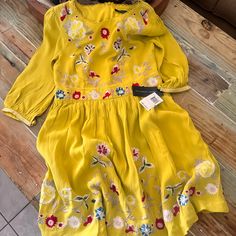 The Perfect Dress For A Special Ocassions Or Just For A Night Out. From The Famous French Connection Brand Originally $248 Casual Spring Dresses With Embroidered Hem, Embroidered Long Sleeve Midi Dress For Spring, Long Sleeve Embroidered Midi Dress For Spring, Spring Embroidered Long Sleeve Midi Dress, Spring Long Sleeve Dresses With Embroidered Hem, Embroidered Long Sleeve Dress For Spring, Yellow Long Sleeve Embroidered Dress For Spring, Yellow Long Sleeve Embroidered Spring Dress, Casual Spring Dresses With Embroidery