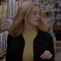 a woman with blonde hair in a grocery store