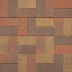 a close up view of a brick floor with different colored bricks on the bottom and sides