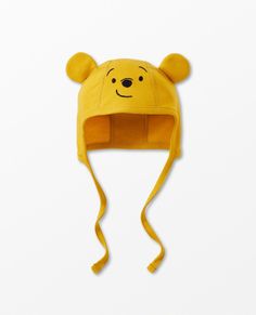 a winnie the pooh hat with ears