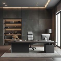 an office with a desk, chair and bookcase in the center is lit by recessed lighting