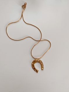 16" gold plated serpentine chain Hollow pendant Appx 1" charm Everyday Gold Horseshoe Necklace, Gold Horseshoe Necklace With Adjustable Chain, Horseshoe Necklace Gold, Gold Pendant Necklace With Horse Design, Brass Snake-shaped Necklace For Gifts, Horseshoe Necklace, Necklace Length, Spring Rings, Ring Necklace