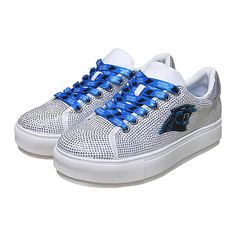 Officially Licensed NFL Team Crystal Shoe Crystals Sneaker Bring the bling to every game with these crystal sneakers from Cuce. The crystal upper is gorgeous and offers a beautiful sparkle to any gameday outfit. Super stylish sleek sneaker style with officially licensed laces and all over crystals with team logo on outside of shoe. This sneaker is sure to show off your fandom and dazzling style. *TRUE TO SIZE - half size should size up. Iced Out Round Toe Sneakers For Streetwear, Bling Sneakers With Round Toe For Streetwear, Trendy Silver Sneakers With Bling, Trendy Silver Bling Sneakers, Iced Out Low-top Sneakers For Streetwear, Sparkling Low-top Sneakers For Streetwear, Casual Silver Sneakers With Rhinestones, Sporty Streetwear Sneakers With Bling, Sporty Bling Sneakers For Streetwear