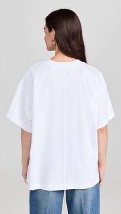 La Ligne Solid Super Oversize Short Sleeve Tee | Shopbop Oversized Casual T-shirt For Daywear, Relaxed Fit Short Sleeve T-shirt For Daywear, Summer Cotton T-shirt With Batwing Sleeves, Relaxed Fit Crew Neck Blouse For Daywear, Oversized T-shirt For Spring Workwear, Cotton Batwing Sleeve T-shirt For Summer, Spring Top With Boxy Fit And Shirttail Hem, Spring Boxy Fit Tops With Shirttail Hem, Spring Boxy Workwear Tops