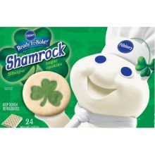 a package of shamrock cookies with a chef's hat on top