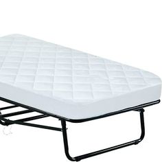 a white mattress sitting on top of a metal frame