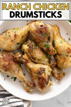 ranch chicken drumsticks on a white plate