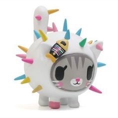 an animal toy with spikes on it's head