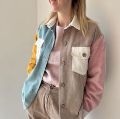 Introducing our stunning women's retrocorduroy shirt, or versatile jacket if you prefer, thanks to its heavyweight fabric. We call it a corduroy shacket. This timeless piece features large, stylish chest pockets and eye-catching coconut buttons. With its oversized design, it's the perfect choice for those cooler days. Crafted from pre-washed, high-quality certified 100 % cotton rorduroy, this shirt offers not only comfort but also sustainability. The sleeves are elegantly finished with adjustabl Collared Corduroy Shacket For Work, Corduroy Shacket With Corduroy Collar For Work, Trendy Cotton Shacket With Corduroy Collar, Corduroy Long Sleeve Shacket For Work, Corduroy Shacket For Work With Long Sleeves, Corduroy Workwear Shacket With Long Sleeves, Corduroy Jacket Womens, Corduroy Shacket, Cord Shirt