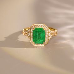 *Condition: Brand new *Center Stone: Natura emerald from Zambia, Emerald Cut approx 2.56ct *Side Stone: Natural white diamond, round cut, approx 0.48ct (VS1 clarity and F color) *Ring Weight: approx 3.79g *Metal Purity: Can be select Each piece is made-to-order with care and special attention to detail. all items are made with conflict-free diamonds and gems. Size: made to order The item will be gift wrapped and shipped. --------------------------------------------------------- Available in : 14 Luxury Emerald Cut Emerald Ring With Halo Design, Luxury Emerald-cut Emerald Ring With Halo Design, Luxury Tsavorite Rings With Halo Setting, Luxury Emerald Ring For Anniversary, May Birthstone, Gia Certified Tsavorite Diamond Ring For Formal Occasions, Luxury Vvs Clarity Emerald Ring For May Birthstone, Luxury Gia Certified Emerald Ring For May Birthstone, Elegant Gia Certified Emerald Ring, Luxury Emerald Ring With Halo Design