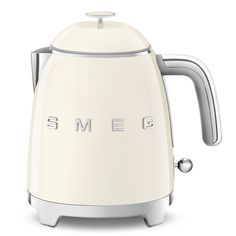 an electric kettle with the word smeg on it