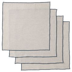 four linen napkins in various colors and sizes