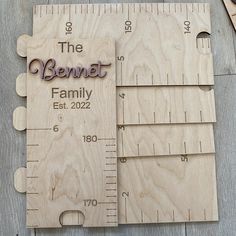 a wooden ruler with the words the benet family on it