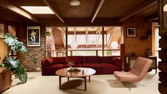 a living room filled with furniture next to a window