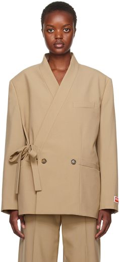 Wool twill blazer. · Wrap construction · Shawl collar · Button closure with self-tie fastening · Welt pockets · Padded shoulders · Logo patch at cuffs · Three-button surgeon's cuffs · Twin vents at back hem · Welt pocket at interior · Full viscose satin lining Supplier color: Dark beige Kimono Blazer, Beige Kimono, Kenzo Clothing, Dark Beige, Womens Blazers, Mens Activewear, Shawl Collar, Womens Sweatpants, Blazers For Women