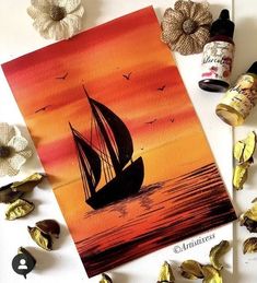 a card with a painting of a sailboat in the ocean at sunset and seagulls around it