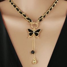 Material :Zinc Alloy Black/Gold Color Very Elegant And Classy Wear For All Occassions Black Necklace With Gold Chain For Gift, Black Metal Dangle Necklaces, Black Metal Dangle Necklace, Elegant Black Adjustable Chain Necklace, Elegant Black Tassel Necklace For Party, Black Metal Lariat Necklaces, Black Lariat Metal Necklace, Chic Gold Tassel Necklace For Gifts, Party Chain Necklace With Black And Gold Chain