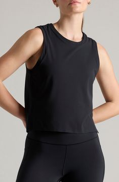 Stay cool and comfortable in this UPF-protective tank cut from a supersoft knit GoldFusion™ antimicrobial technology that keeps it fresh between washes. 21 1/2" length (size Medium) Jewel neck Moisture-wicking fabric engineered for dryness and comfort Chafe-free seamless construction for comfort UPF 50+ sun protection GoldFusion antimicrobial technology with gold nanoparticles is engineered to inhibit the growth of odor-causing germs and remains 99.9% effective for the lifetime of the garment 76 Black Seamless Tank Activewear, Black Sporty Seamless Tank Top, Everyday Stretch Muscle Tee, Black Compressive Racerback Top, Black Go-dry Top For Yoga, Black Go-dry Tops For Yoga, Compressive Seamless Top For Layering, Seamless Compressive Tops For Layering, Black Compressive Sportswear Tank Top