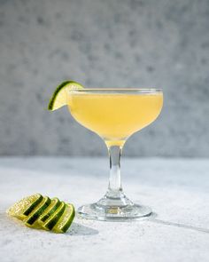 a margarita with a slice of lime on the rim