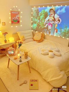 a bed room with a neatly made bed and cartoon characters on the wall behind it