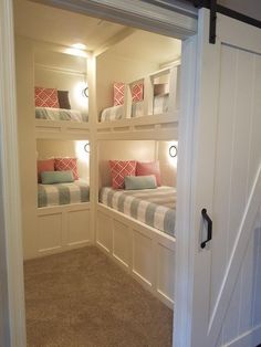 the bunk beds are all made up and ready to be used as children's room