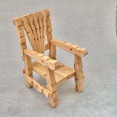 a wooden chair made out of pieces of wood