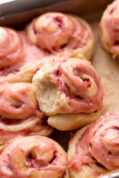 strawberry cinnamon rolls with icing in the middle