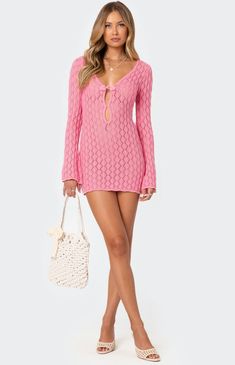 Online only!  Nothing says summer days like the perfect crochet dress. This crochet mini dress, with its cut-out detailing, is the ultimate dress to throw over all your swimwear and keep you looking cool on those extra hot days.   	Mini dress 	Long sleeves 	V neck 	Cut out detailing 	Crochet fabric 	Cotton, Polyester 	Model wears size S 	Model height is 5'11 	Item care: Wash with similar color Pool Party Outfit, Long Sleeve Crochet, Vintage Knitwear, Sleeve Crochet, Crochet Cover Up, Crochet Fabric, Crochet Mini Dress, Swimwear Dress, Knit Mini Dress