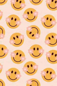 a wallpaper with smiley faces and pink flowers