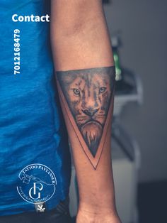 a man's arm with a lion tattoo on it and the words contact written below