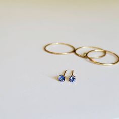 "These stud earrings feature genuine Tanzanite in a 14K Gold filled setting. They are perfect for effortless, everyday wear and transition well from day to night. Tanzanite has a rich blue color with a hint of purple. This is the birthstone for December, making it the perfect gift for December babies. DETAILS 3mm | 14K Gold filled | Genuine Tanzanite | Made to order My earrings are handmade to order and therefore one of a kind. Please also note that since I work with natural gemstones, the color Everyday 14k Gold Round Cut Earrings, Minimalist Birthstone Earrings, Minimalist Birthstone Earrings For Everyday, Minimalist Everyday Earrings With Birthstone, Gold Solitaire Earrings As A Gift, Solitaire Round Earrings For Everyday, Dainty Birthstone Earrings For Everyday, 14k Yellow Gold Solitaire Earrings, Minimalist White Gold Birthstone Earrings