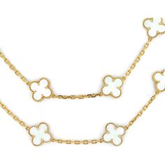 Marvel at the fusion of historic craftsmanship and modern elegance in the Van Cleef & Arpels Alhambra 18K Yellow Gold 20 Motif Circa 1985 White Coral Necklace. Transport yourself to a world of timeless beauty with this vintage piece, showcasing Van Cleef & Arpels' iconic Alhambra design. Crafted in exquisite 18K yellow gold, this necklace features 20 clover-shaped motifs adorned with creased textures and delicate gold bead trimmings.The centerpiece of this stunning necklace is the rare and elegant white coral, adding a touch of natural allure and sophistication to your ensemble. Each motif is a symbol of luck and charm, embodying the essence of Van Cleef & Arpels' legendary craftsmanship and artistic flair.This necklace is not just a piece of jewelry; it's a statement of style and heritage White Designer Jewelry With 17 Jewels, Designer White Jewelry With 17 Jewels, Luxury White Gold Plated Necklaces, Luxury White Necklaces With Polished Finish, White Luxury Jewelry With Polished Finish, Luxury White Jewelry With Polished Finish, Luxury White Necklaces, Luxury White Hallmarked Jewelry, Formal White Plated Jewelry