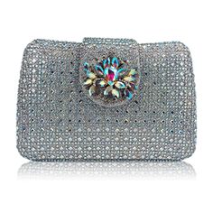 PRICES MAY VARY. ◆Unique Rhinestone Floral Evening Bag.◆ The evening bag is composed of square and round rhinestones of different sizes in a shiny, unique trapezoidal shape, elegant and stylish.Magnetic clasp, with floral rhinestone embellishment in the center. ◆Size & Capacity.◆ Dimensions: L7.48 x H4.72 x W1.57 inches, about 19 x 12 x 4 cm.Handle length: 7.87inch (about 20cm). This women's evening bag can hold your mobile phone, lipstick, keys, foundation case, small mirror, other small things Formal Bag, Floral Clutches, Small Mirror, Cute Nike Shoes, Evening Handbag, Cute Nikes, Small Mirrors, Beautiful Evening, Bags Black