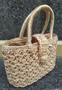 "Welcome! A beautiful vintage beige raffia handbag In good vintage condition! Measures: W: 9.24\" (24 cm) H with handles: 9.24\" (24 cm) Deep: 3.5\" (8 cm) Thanks for stopping by!!IMPORTANT: Due to the delicate situation We're all going through, and in order to keep the safety of courier workers too, all orders will be dispatched when alert sanitary finished. You can purchased or reserve items like always. Thanks so much for your understanding." Elegant Beige Straw Bag With Top Carry Handle, Elegant Straw Bags With Rolled Handles, Elegant Basket Straw Bag With Rolled Handles, Beige Basket Shoulder Bag With Top Carry Handle, Elegant Natural Straw Bag With Top Carry Handle, Beige Basket Bag With Top Carry Handle, Vintage Beige Handheld Shoulder Bag, Beige Basket Shoulder Bag With Detachable Handle, Elegant Straw Tote Bag