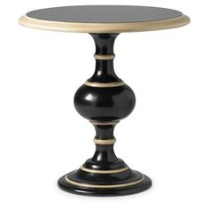 a black and gold pedestal table on a white background