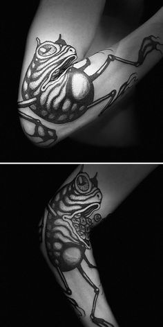 black and white photo of frog tattoo on arm