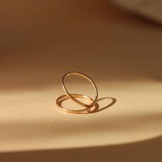 A simple and beautiful ring that symbolizes the never-ending. 14k gold fill Each piece of Token Jewelry is handmade in their Eau Claire, WI studio. Simple Everyday 14k Gold Stackable Rings, Minimalist Rose Gold Infinity Ring, 14k Gold Filled Minimalist Stackable Promise Rings, Minimalist 14k Gold Filled Stackable Promise Rings, Minimalist 14k Gold Filled Stackable Rings For Anniversary, Minimalist 14k Gold Filled Midi Rings With Open Shape, Minimalist 14k Gold Filled Open Ring, Minimalist 14k Gold Filled Open Midi Rings, Everyday Rose Gold Midi Rings In Recycled Gold