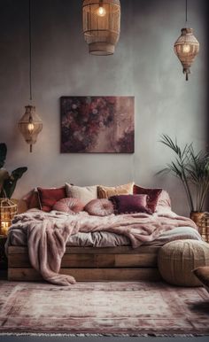 a large bed sitting in the middle of a living room next to a painting on the wall