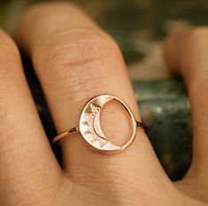 **PLEASE NOTE: This item is MADE TO ORDER. Current production times are listed below (Ready to ship in---) and in the announcement section of my shop's homepage. **Artist crafted. Original design made in Richmond, VA.** Dainty crescent moon circle ring in your choice of solid 10k gold or sterling silver. Polished finish with brushed satin accents. **If unsure of your ring size, you can be easily measured at any local jewelry store. In the event that you order the wrong size, resizing (when possi Celestial Everyday Adjustable Rings, Celestial Open Ring With Moon Phase Detail, Celestial Moon Phase Open Ring Jewelry, Adjustable Celestial Rings For Everyday Wear, Nickel-free Celestial Moon Ring, Celestial Moon Phase Open Ring, Everyday Adjustable Celestial Rings, Celestial Open Ring With Moon Charm, Adjustable Moon Charm Promise Ring