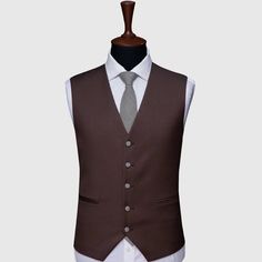 Elegant Brown Vest With Notch Lapel, Elegant Brown Notch Lapel Vest, Brown Business Vest With Notch Lapel, Brown Notch Lapel Vest For Business, Semi-formal Brown Three-piece Suit, Formal Brown Sleeveless Outerwear, Brown Sleeveless Formal Outerwear, Elegant Brown Business Vest, Tailored Brown Vest With Notch Lapel