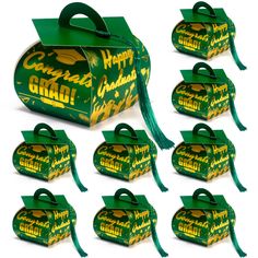 a bunch of green and yellow boxes with tassels on them that say congratulations graduate