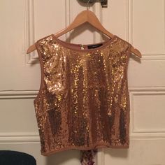 Forever 21 Cropped Gold Sequin Top. Size L, But It Runs Small. Never Worn, But The Tags Have Been Taken Off. Sequin Tops For Date Night In Summer, Spring Sequin Tops For Date Night, Sequined Tops For Date Night In Spring, Fitted Gold Crop Top For Spring, Gold Tops For Date Night And Party Season, Cropped Sequin Tops For Spring, Sequin Tops For Going Out In Spring, Forever 21 Crop Top For Night Out In Spring, Sequined Cropped Top For Fall