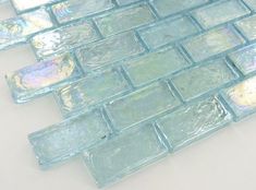 a close up shot of some glass tiles