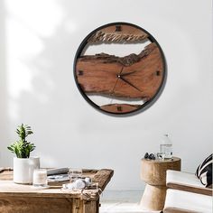 a clock made out of wood sitting on top of a table next to a chair