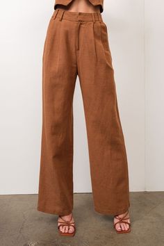 Selma Trouser Brown linen pleated trousers. High-rise with zip fly Relaxed straight leg Back elastic waistband Side pockets A matching pair with the Selma Linen Vest Linen / Viscose Blend | Model is 5'8" and wearing a size Small Linen Trousers Outfit, Vest Linen, Linen Vest, Trouser Outfit, Matching Sets Outfit, Corset Crop Top, Frankies Bikinis, Pleated Trousers, Skirt Jumpsuit