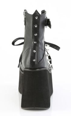 The Kera series features an impressive platform wedge across a range of styles to suit everyone who wants to tower over the competition. Vegan Black PU leather 4 1/2" Inch (114mm) Platform Lace-Up Front Ankle Boot Featuring Top Skull Buckle Strap & Metal Spike Stud Details Inner Side Metal Zip Closure U.S women's sizing-refer to size chart for more info Punk High Ankle Platform Boots In Synthetic, Punk High-top Platform Boots In Synthetic Material, Punk High-top Synthetic Platform Boots, Punk Style Platform Boots In Synthetic Material, Punk Style Synthetic Platform Boots With Pointed Toe, Punk Style Platform Boots With Pointed Toe, Punk Leather Wedge Heel Boots, Leather Platform Boots With Pointed Toe For Alternative Fashion, High-top Leather Platform Boots With Rivets