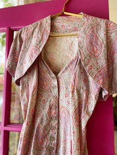 Pink paisley fabric with matching bolero jacket. Strap dress with rhinestone buttons. beat on size small sizing: Vintage sizing varies so our Suggested size is the size it comes closely to fitting in modern day sizing but knowing your measurements is the best way to shop vintage. Condition: This item is vintage meaning it had a life before it got to you. Additional small signs of wear such as material pilling are normal and not considered a defect of the garment Paisley Fabric, Bolero Jacket, Pink Paisley, Dress Set, Small Signs, Strap Dress, Event Dresses, Vintage Dress, Vintage Accessories