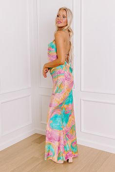 - Sip your sangria in style with this chic maxi! With a colorful marbled print and a fabulous gold colored chain accent at the back, this piece is giving luxe style vibes. Step into stunning style with this fabulous dress! - Unlined material with a satin finish and an abstract marbled print featuring pink, blue, and orange hues - A cowl neckline - This spaghetti straps that lace and tie at the back - A gold chain link accent draped across the back - Pleated accents at the side - A flattering sil Chic Pink Backless Maxi Dress, Chic Fitted Maxi Dress With Vibrant Print, Chic Multicolor Backless Maxi Dress, Chic Multicolor Maxi Dress With Tie Back, Multicolor Maxi Dress With Tie Back, Chic Flowy Maxi Dress With Vibrant Print, Multicolor Maxi Dress With Tie Back For Party, Short One Piece, Fabulous Dress